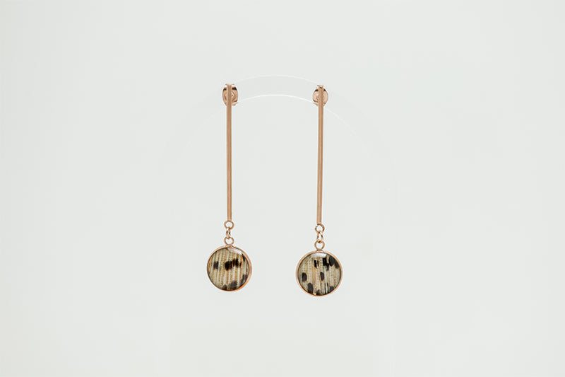 Long Rose Gold Drop Earrings on a white background.