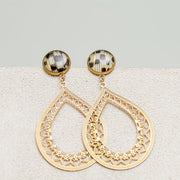 Teardrop Lace Earrings on a white and cream background.