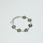 A Silver Tennis Bracelet on a white background.