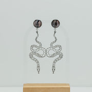 Snake Earrings on a white background.