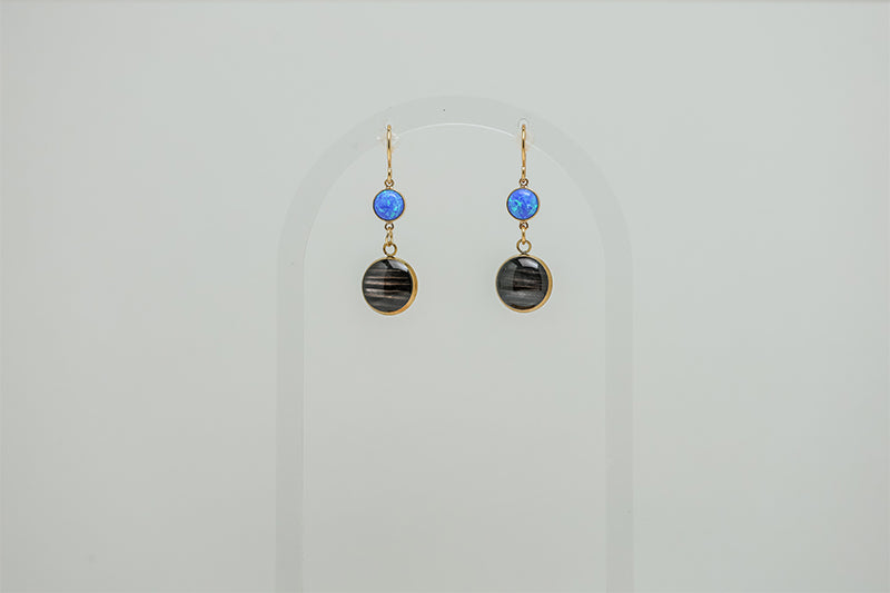 Caribbean Blue Opal Earrings on a white background. 