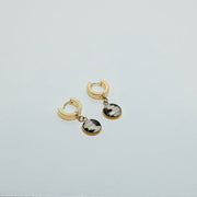 Golden Huggies on a white background.