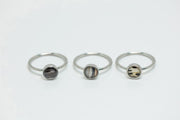 Three Mini Silver Rings on a white background.