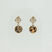 Gold Enchanted Emerald Earrings on a white background. 