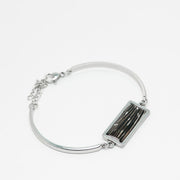 A silver Bar Bracelet on a white background.