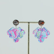 A pair of Preppy Scalloped Earrings on a gold stand on a white background. 