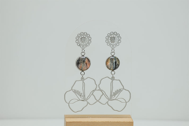 Hibiscus Mandala Drops on a white background.