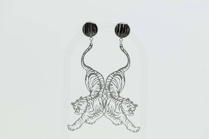 Tiger Earrings on a white background. 