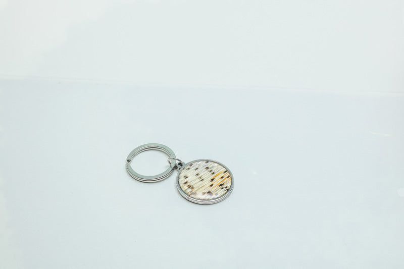 A Silver Keychain ring on a white background.