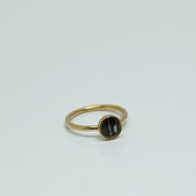 A Mini Gold Ring on a white background.