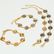 Four Gold Tennis Bracelets on a white background - fins are either all tail, all pectoral, all pelvic or mixed. 