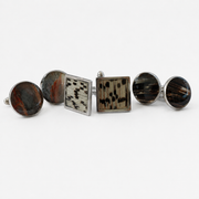 Two Round and one Square lionfish Cuff Link Sets on a white background.